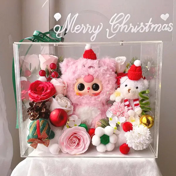 Pink fluffy bunny and teddy bear with flowers in a clear box with "Merry Christmas" text.