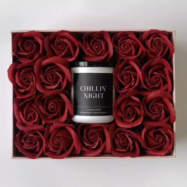 Gift set with red roses and a candle labeled "CHILLIN' NIGHT".