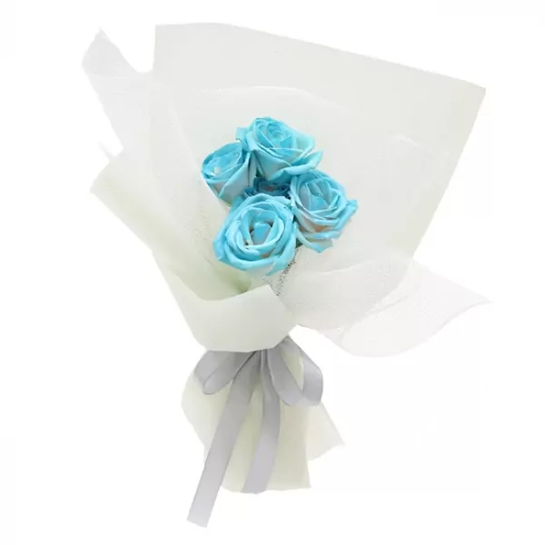 A bouquet of 4 blue roses wrapped in white mesh and tied with a grey ribbon.