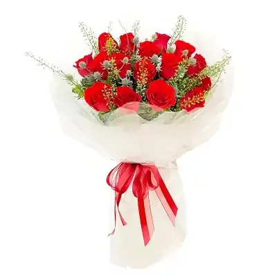 A bouquet of 18 red roses, wrapped in white paper and tied with a red ribbon.