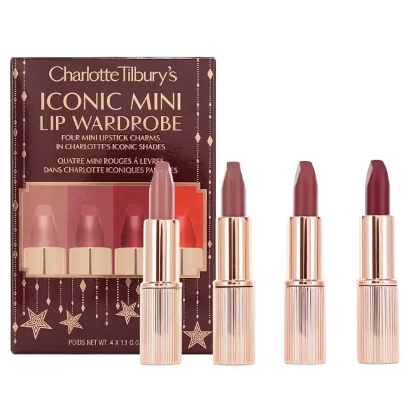 Charlotte Tilbury Iconic Mini Lip Wardrobe lipstick set with four mini lipsticks in rose gold cases.