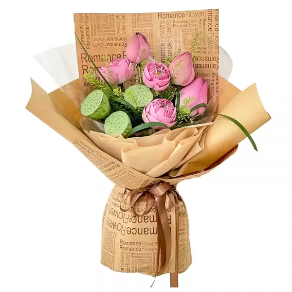 Pink lotus flower bouquet with lotus seed pods, wrapped in brown paper with "Romance Flowers" print.