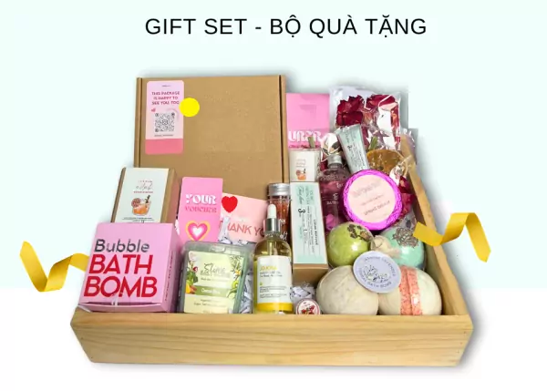 Gift set with bath bombs, body oil, body scrub, incense, and perfume in a wooden tray.