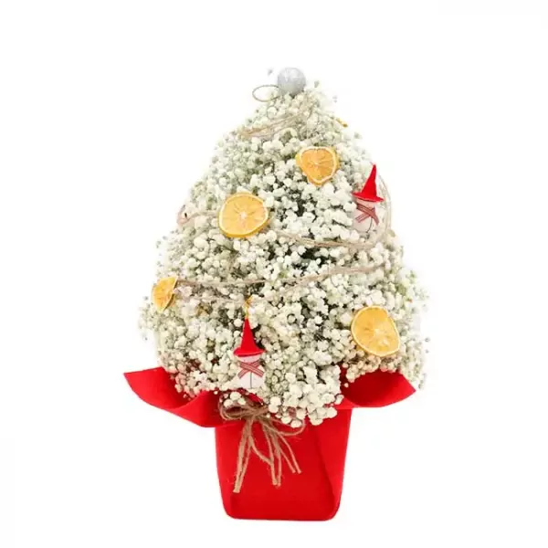Miniature Christmas tree made of baby's breath flowers, adorned with dried orange slices and festive ornaments.