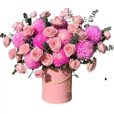 Pink roses and hot pink chrysanthemums in a pink box.