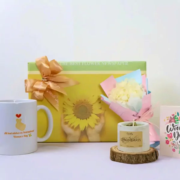 Gift box with sunflower, mug, and lemongrass candle for Women's Day.