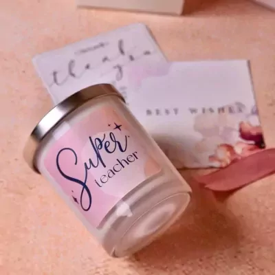 "Super Teacher" scented candle with gift cards.