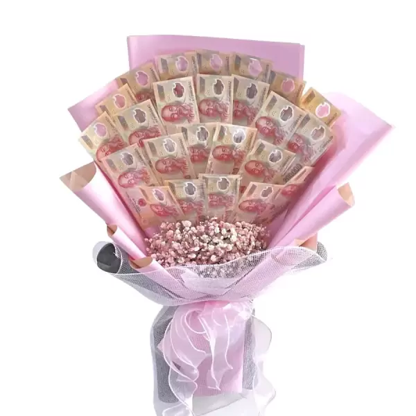 Money bouquet with pink wrapping and baby's breath flowers.