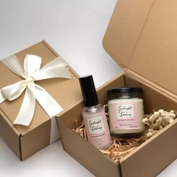 Gift box with scented candle and room spray, "Goodnight Darling" labels.
