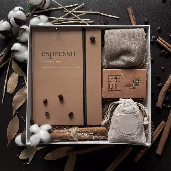 Espressiano gift set with notebook, socks, soap, and burlap bag.