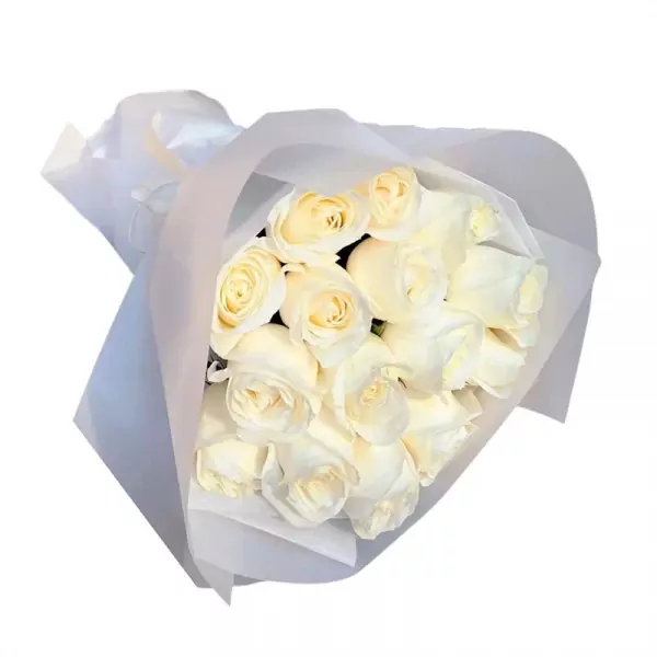 Bouquet of 15 white roses wrapped in white paper.