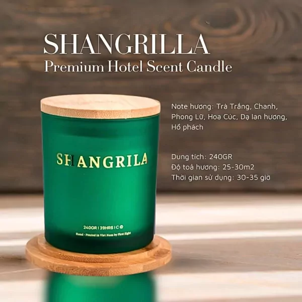 Green Shangrila scented candle with wooden lid on a wooden coaster, detailed description and product information.