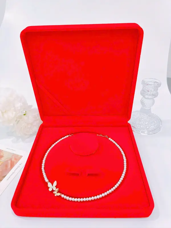 Pearl necklace with butterfly charm 3