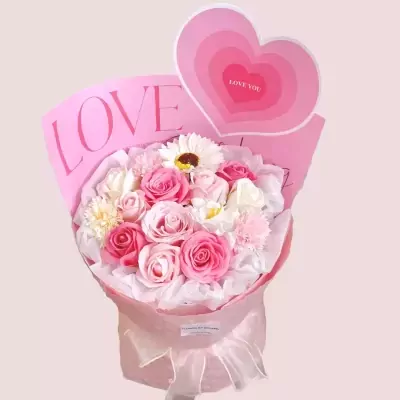 Pink roses and white flowers arranged in a bouquet with a pink heart and "LOVE YOU" message.