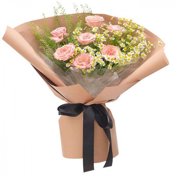 Pink cappuccino roses with daisies, wrapped in kraft paper and tied with a black ribbon.